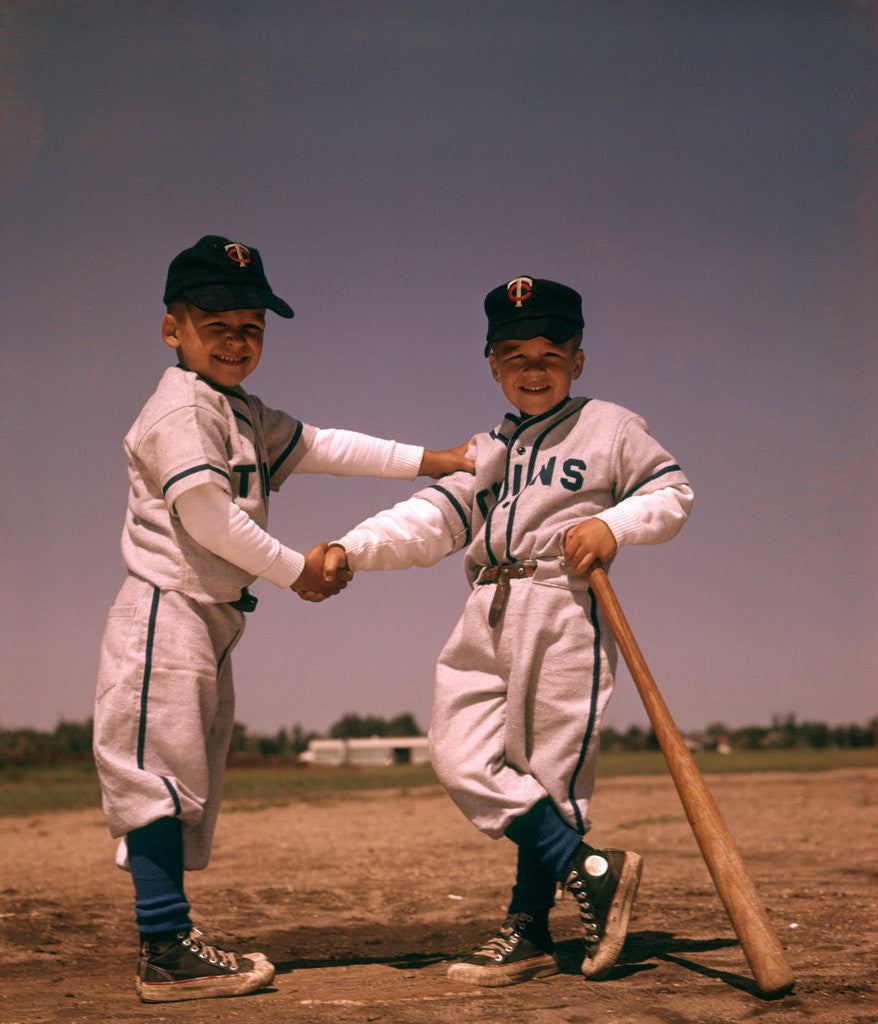 Detail of 1960s Two Boys Playing Little League Baseball Shaking Hands by Corbis