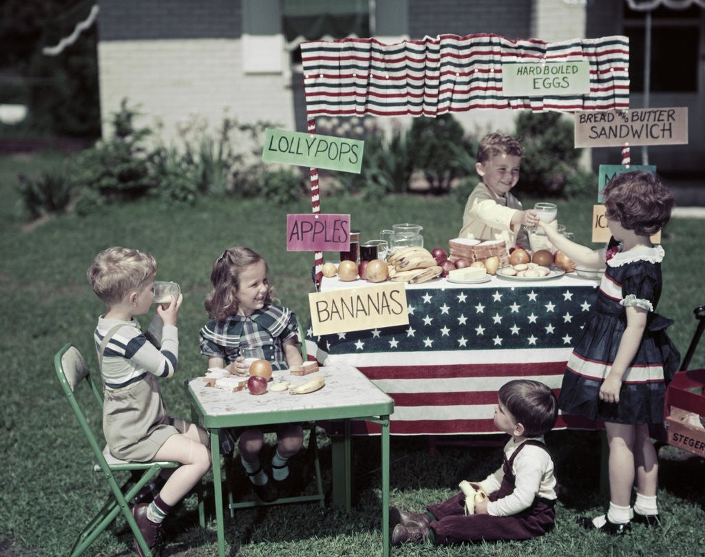 Detail of 1950s Girls And Boys In Business With A Lemonade And Snack Food Stand On The 4th Of July by Anonymous