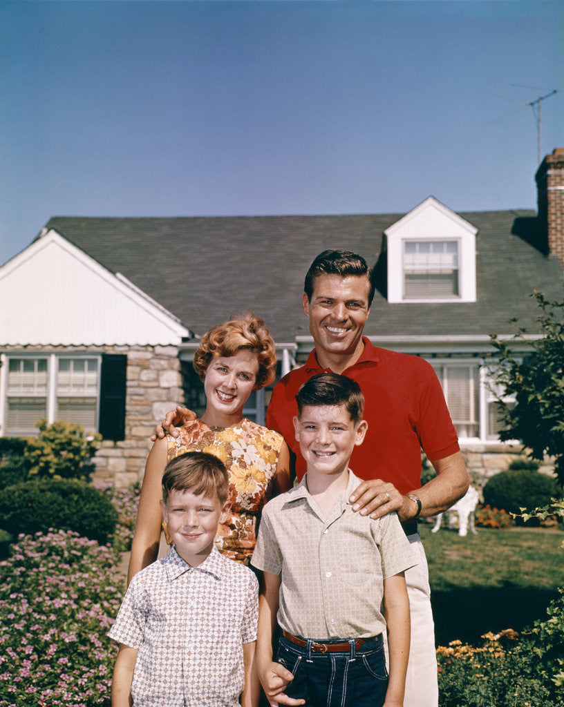 Detail of 1960s Portrait Family Father Mother Two Sons Standing Together In Front Of Suburban House by Anonymous