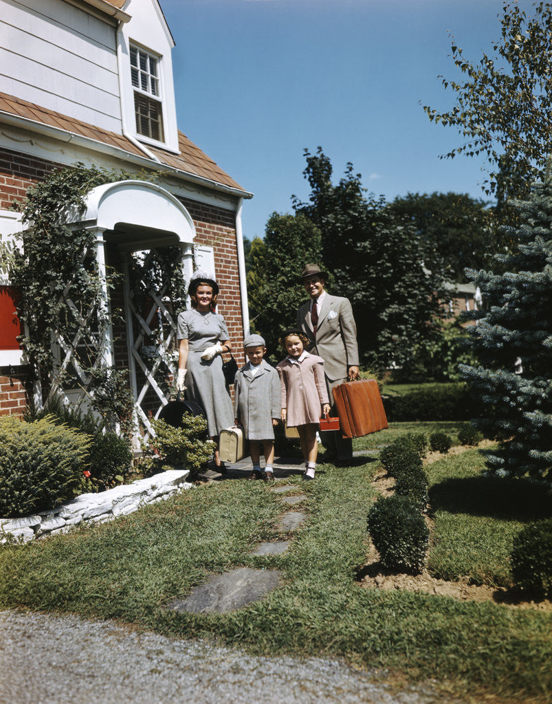 Detail of 1940s 1950s Family Father Mother Daughter Son Leaving Suburban House Carrying Luggage by Anonymous