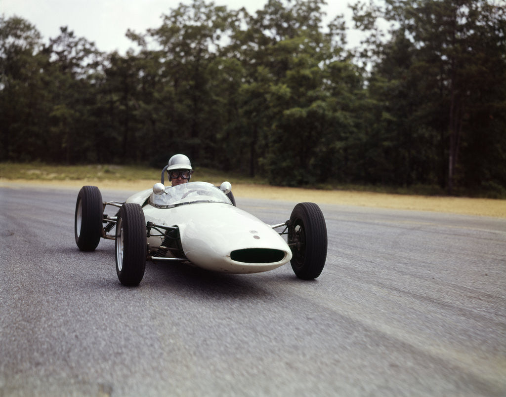 Detail of 1960s Man Race Car Driver Driving Lotus Ford Sports Car by Anonymous