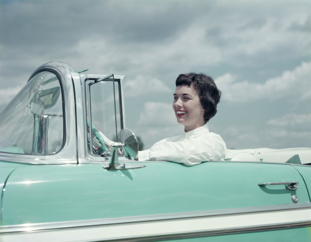 Detail of Woman driving 1956 Chevrolet Bel Air Convertible by Anonymous