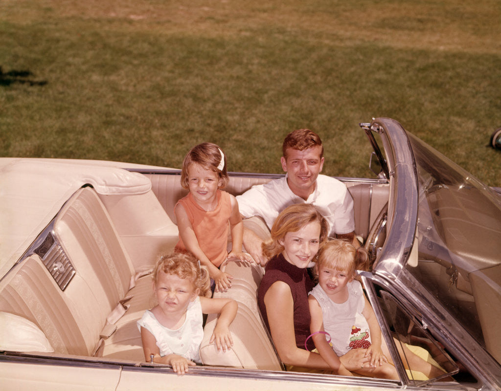 Detail of 1960s 1970s Family Sitting In Open White Convertible Automobile by Anonymous
