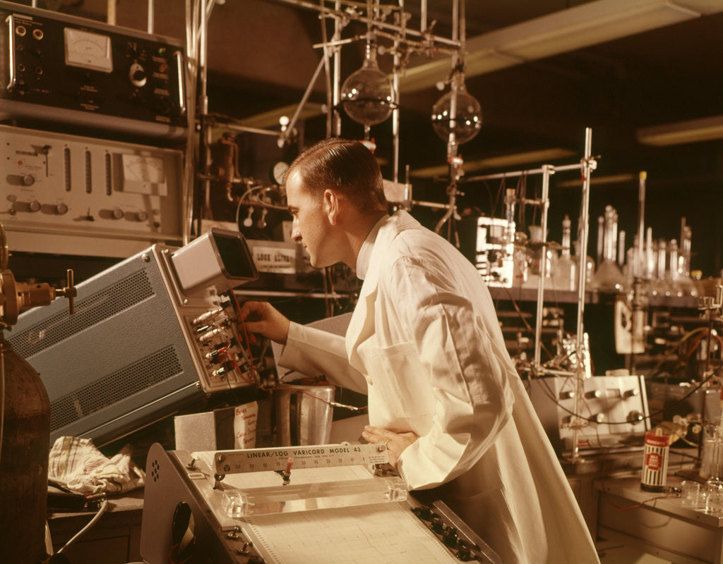 Detail of 1960s Scientist Lab Technician Looking Into Oscilloscope In Laboratory by Anonymous