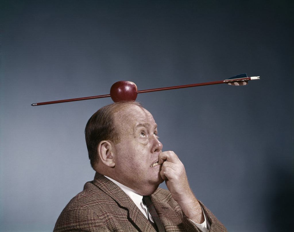 Detail of 1960s Anxious Business Man Biting Finger With Nails Arrow Shot Through Apple On Of His Top Head by Anonymous