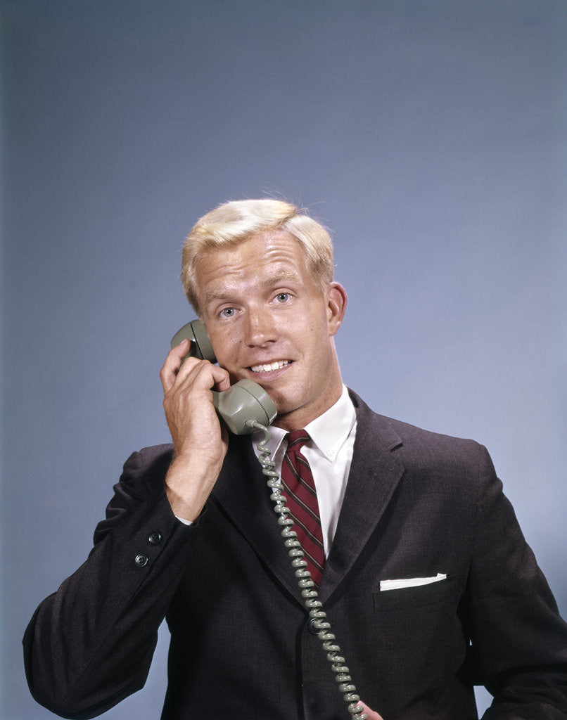 Detail of 1960s Young Businessman Salesman Talking On Telephone by Anonymous