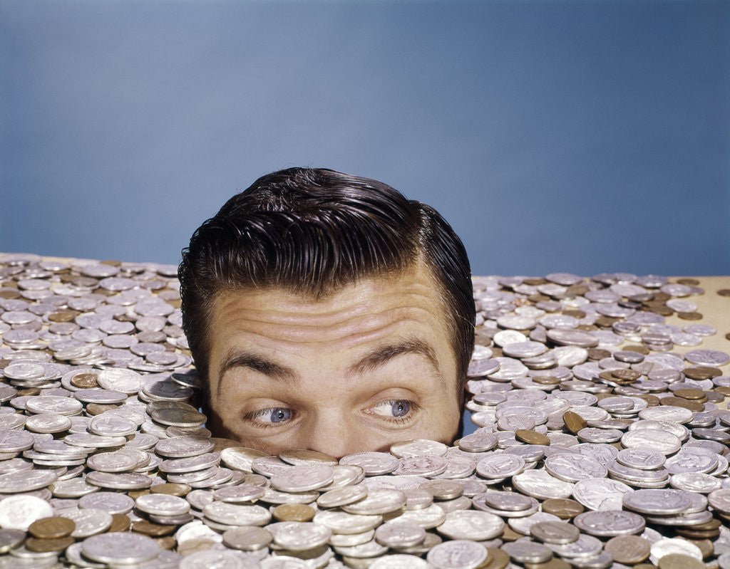 Detail of 1960s Top Of Head And Eyes Of Man Looking Out From Pile Of Coins Studio Symbolic Currency by Anonymous