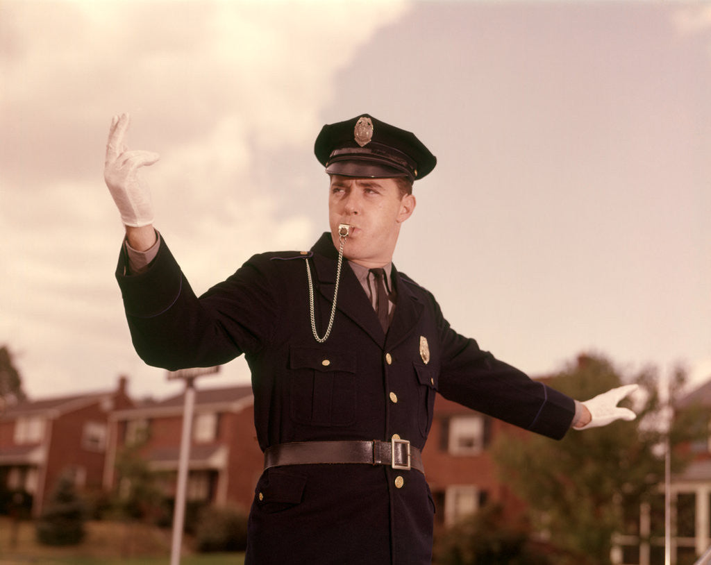 Detail of 1960s Man Policeman Blowing Whistle Directing Traffic by Anonymous