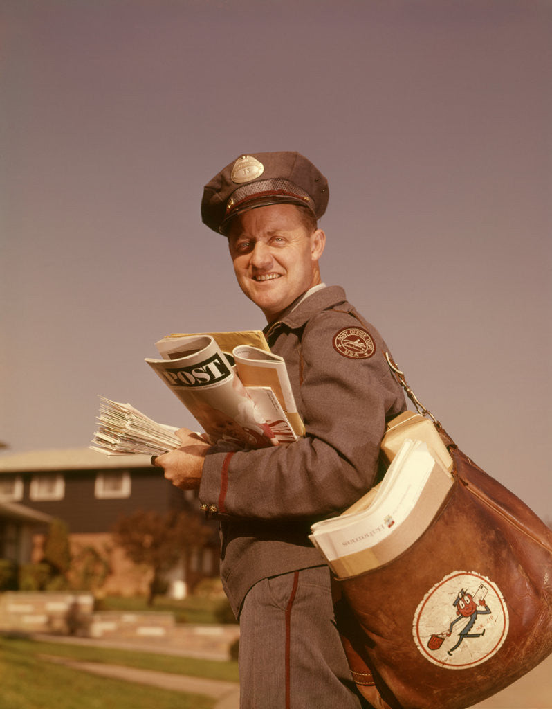 Detail of 1960s Mailman Holding Mail Mailbag Letters Leather Mailbag In Suburban Neighborhood by Anonymous