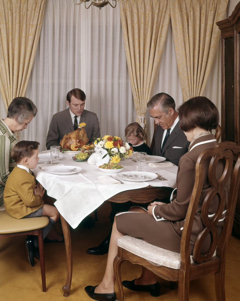 Detail of 1960s 1970s Three Generation Family Saying Grace Prayer At Thanksgiving Dinner by Corbis