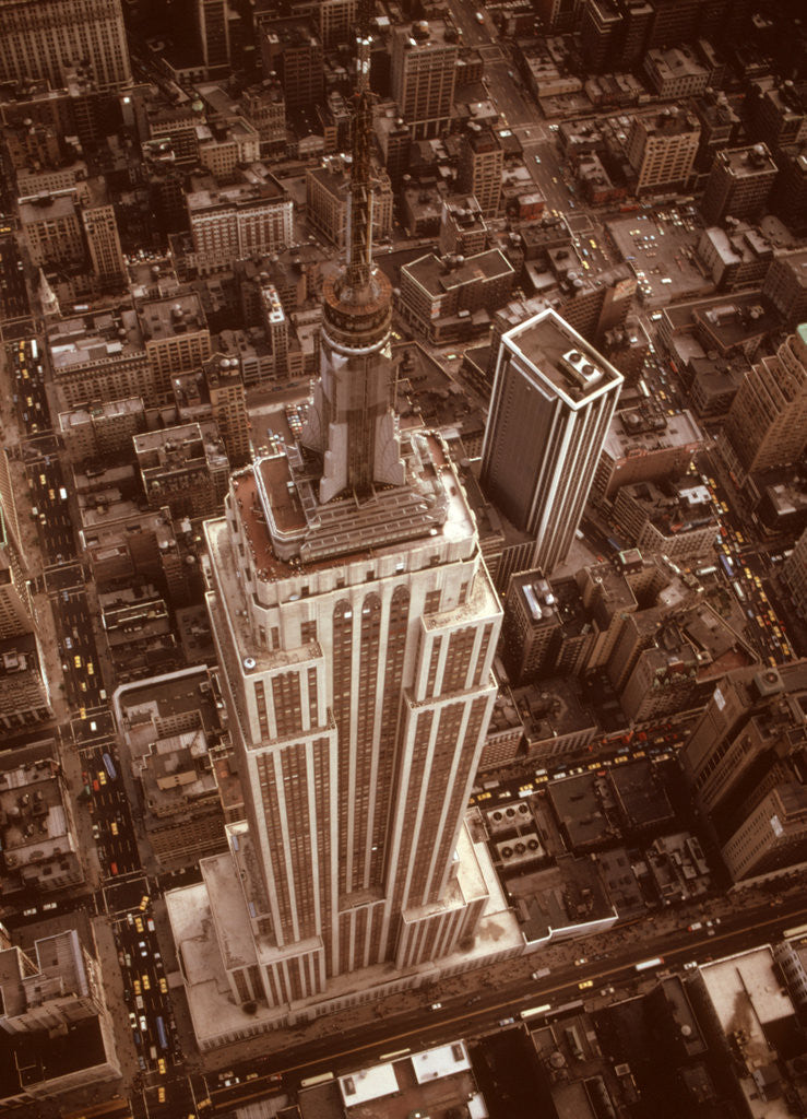 Detail of 1970s Aerial Shot From Helicopter Looking Down Full Length Of Empire State Building by Anonymous
