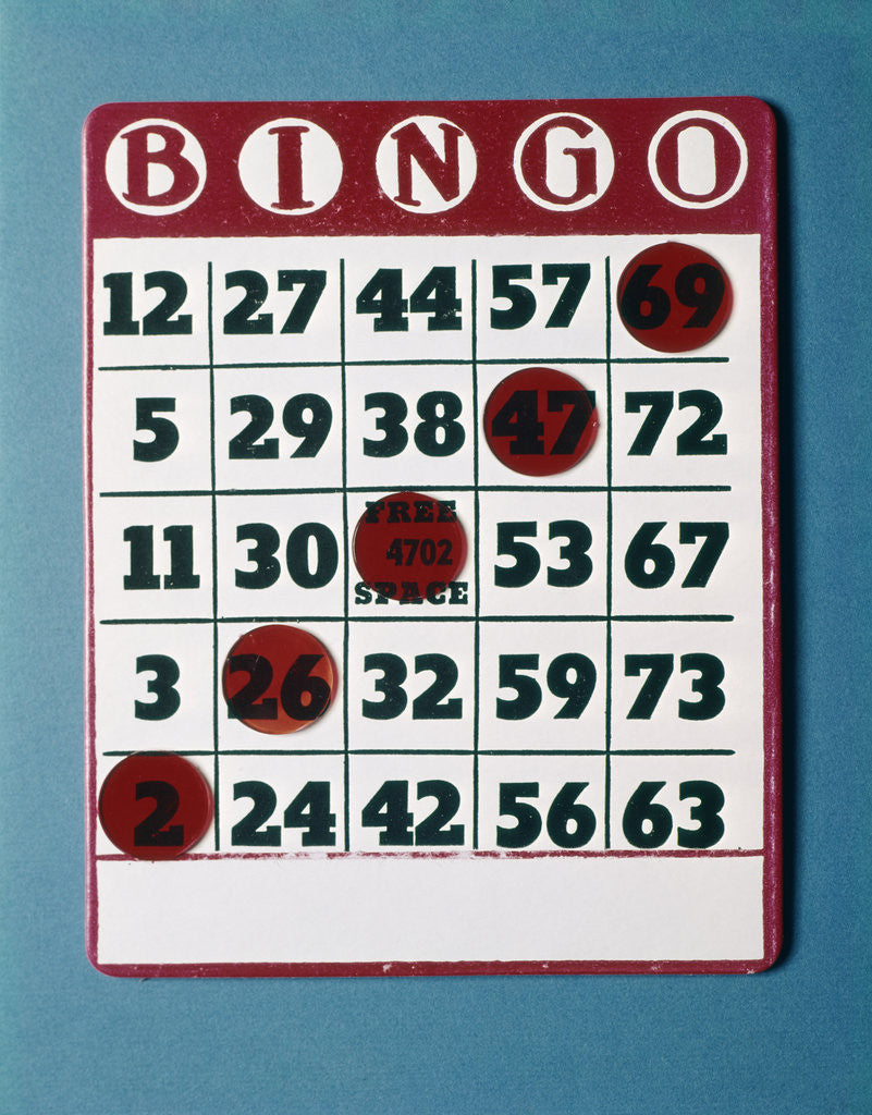 Detail of 1960s Bingo Card With Red Markers In A Winning Game by Corbis