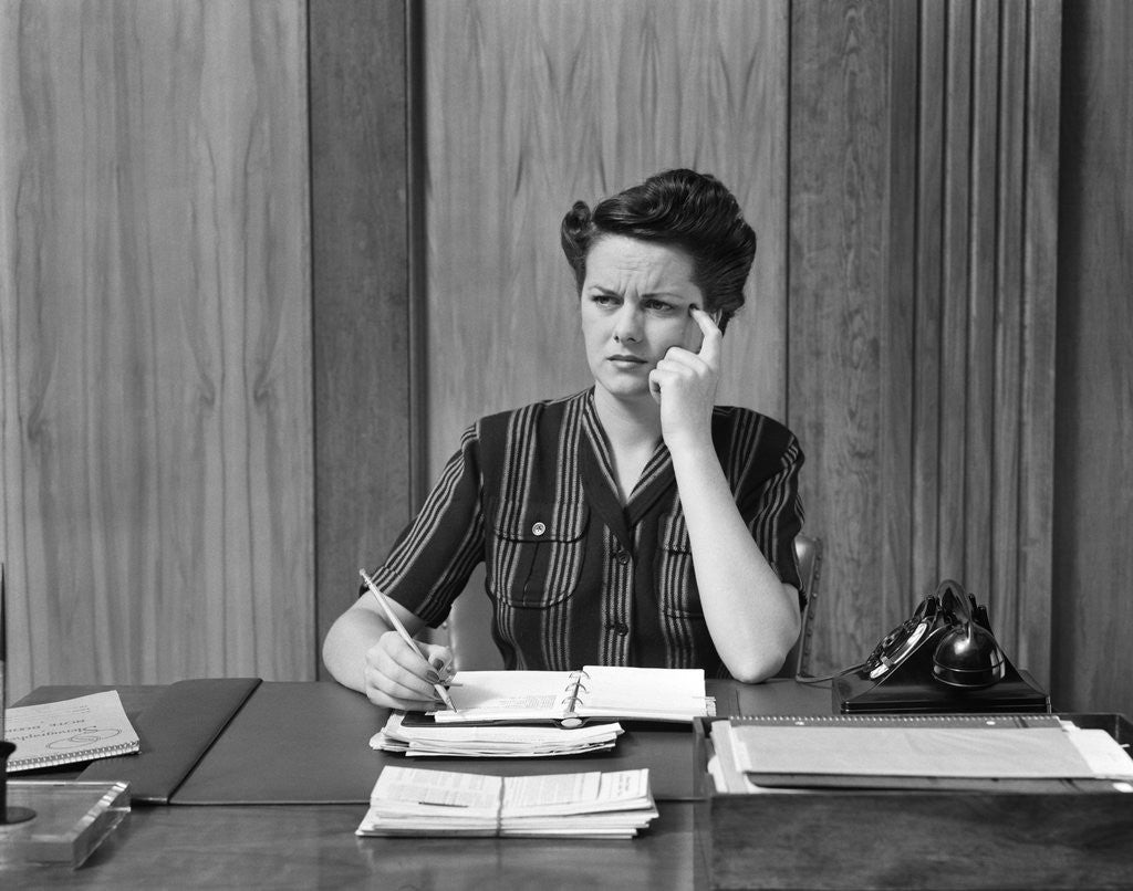 Detail of 1940s Worried Woman Businesswoman Executive At Desk Thinking by Anonymous