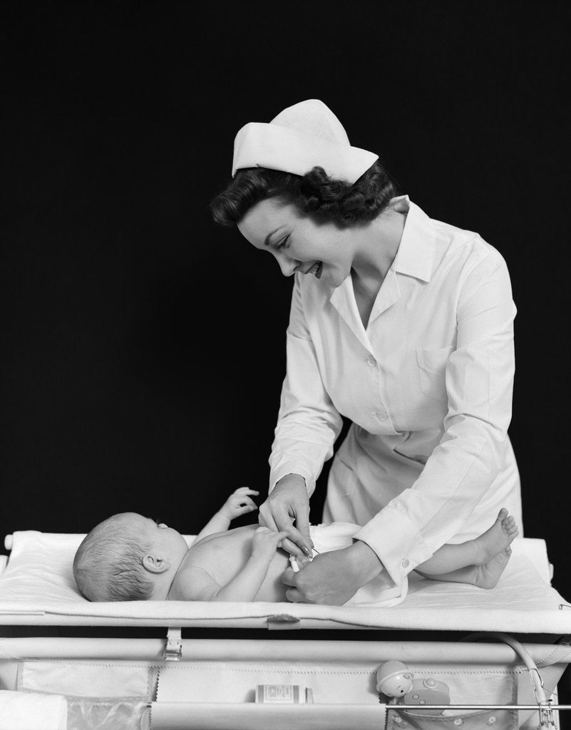 Detail of 1940s Woman Nurse Changing Baby Diaper In Nursery by Anonymous