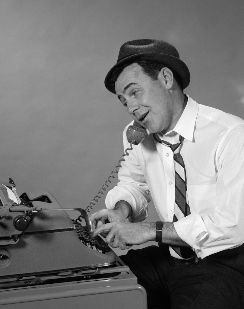 Detail of 1960s Reporter With Hat On Phone At Typewriter by Anonymous