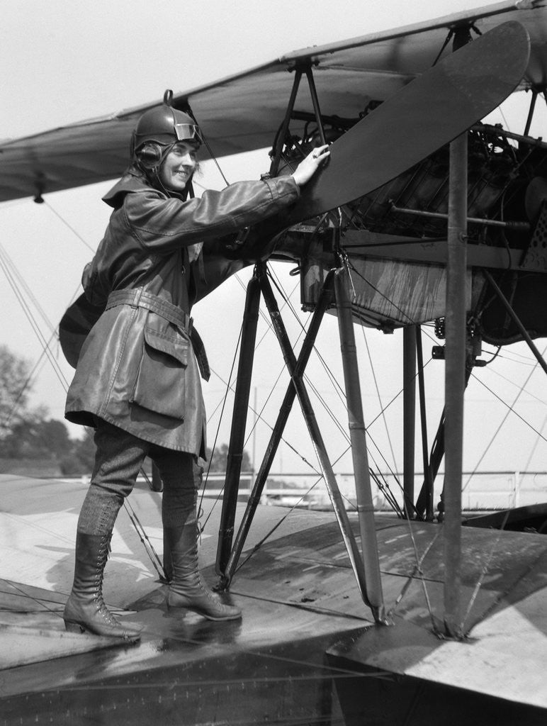Detail of 1920s Woman Aviator Turning Float Biplane Propeller by Anonymous