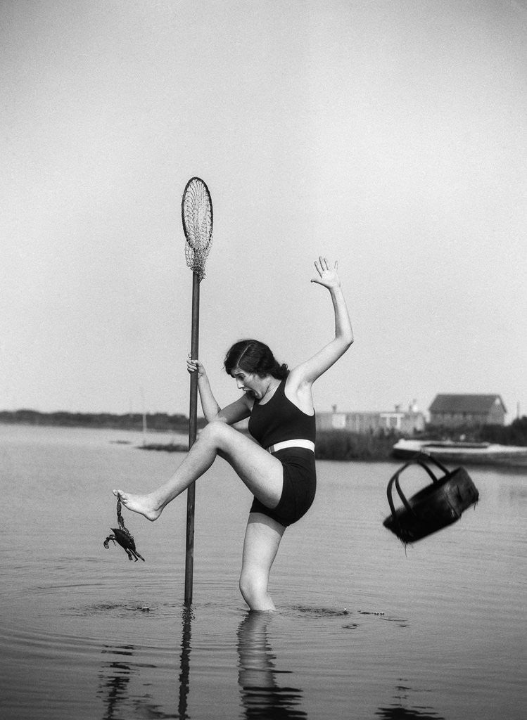 Detail of 1920s Woman Crabbing Surprised By Crab Biting Her Toe by Corbis
