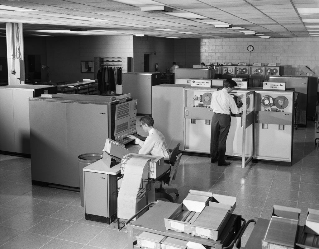 Detail of 1960s Two Men Technicians Working In Ibm 360 Mainframe Computer Room by Anonymous