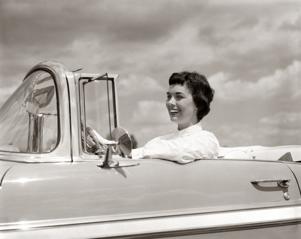 Detail of 1950s Woman Driving Chevrolet Convertible Automobile by Anonymous