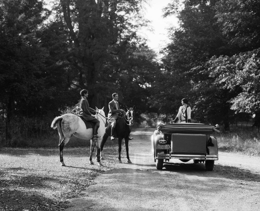 Detail of 1920s 1930s Couple On Horses Meeting Woman On Road In Convertible Touring Car by Anonymous