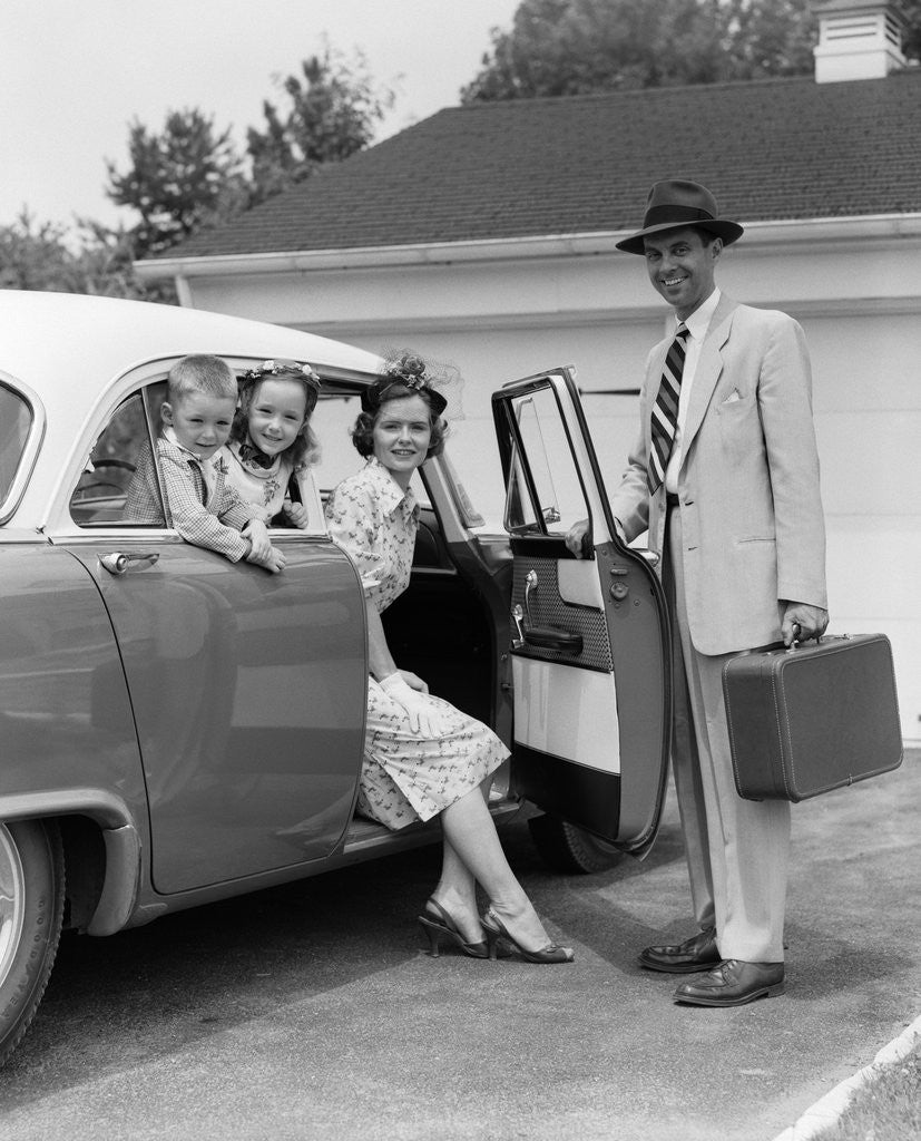 Detail of 1950s Man Opening Automobile Door For Woman by Corbis