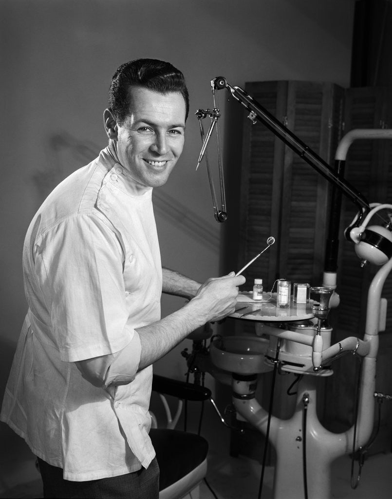 Detail of 1960s Portrait Man Professional Dentist Holding Dental Tool Mirror by Anonymous