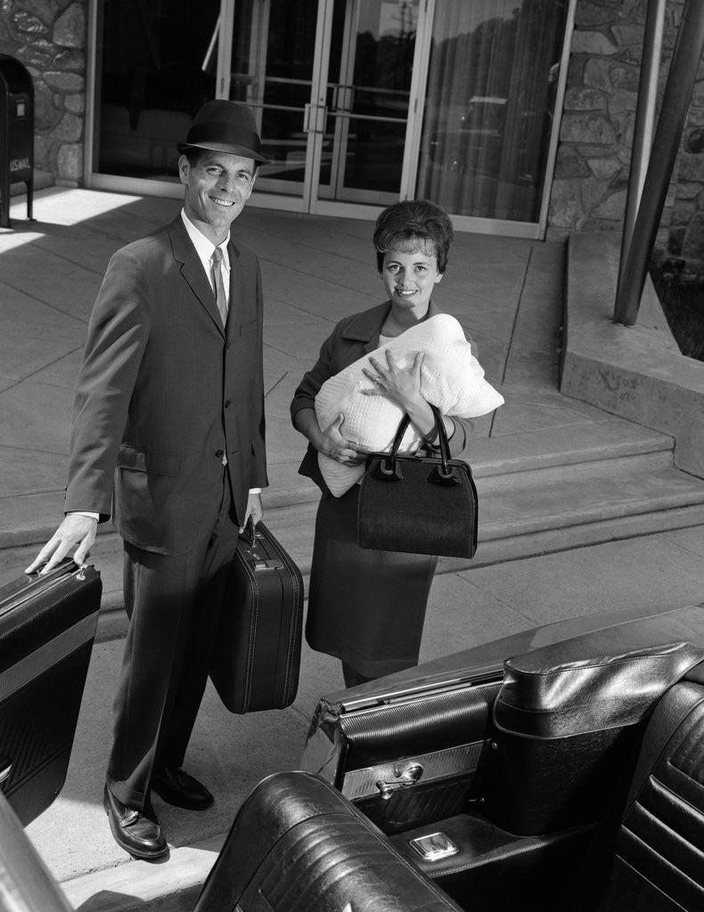 Detail of 1960s Couple Taking New Baby Home From Hospital by Corbis