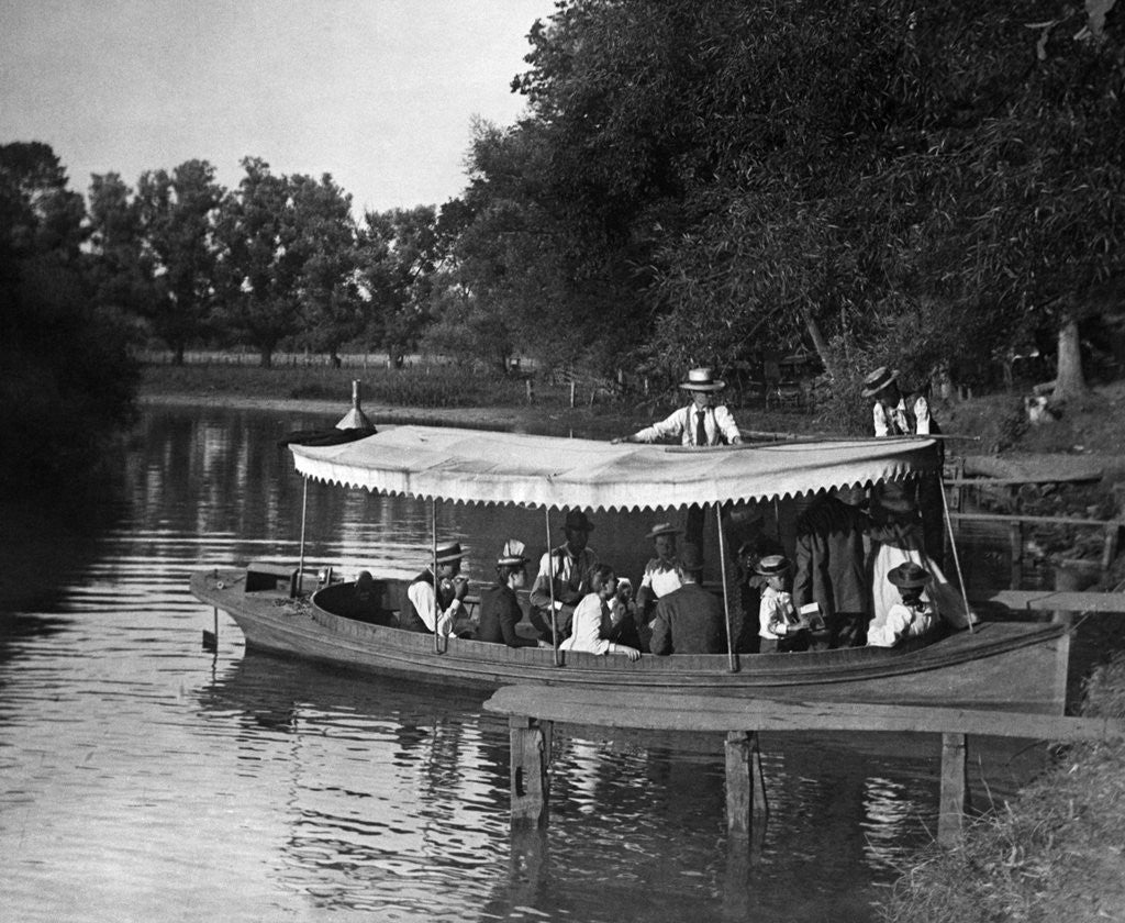 Detail of 1890s 1900s Group In Boat With Canopy Being Pushed Out Into Lake by Anonymous