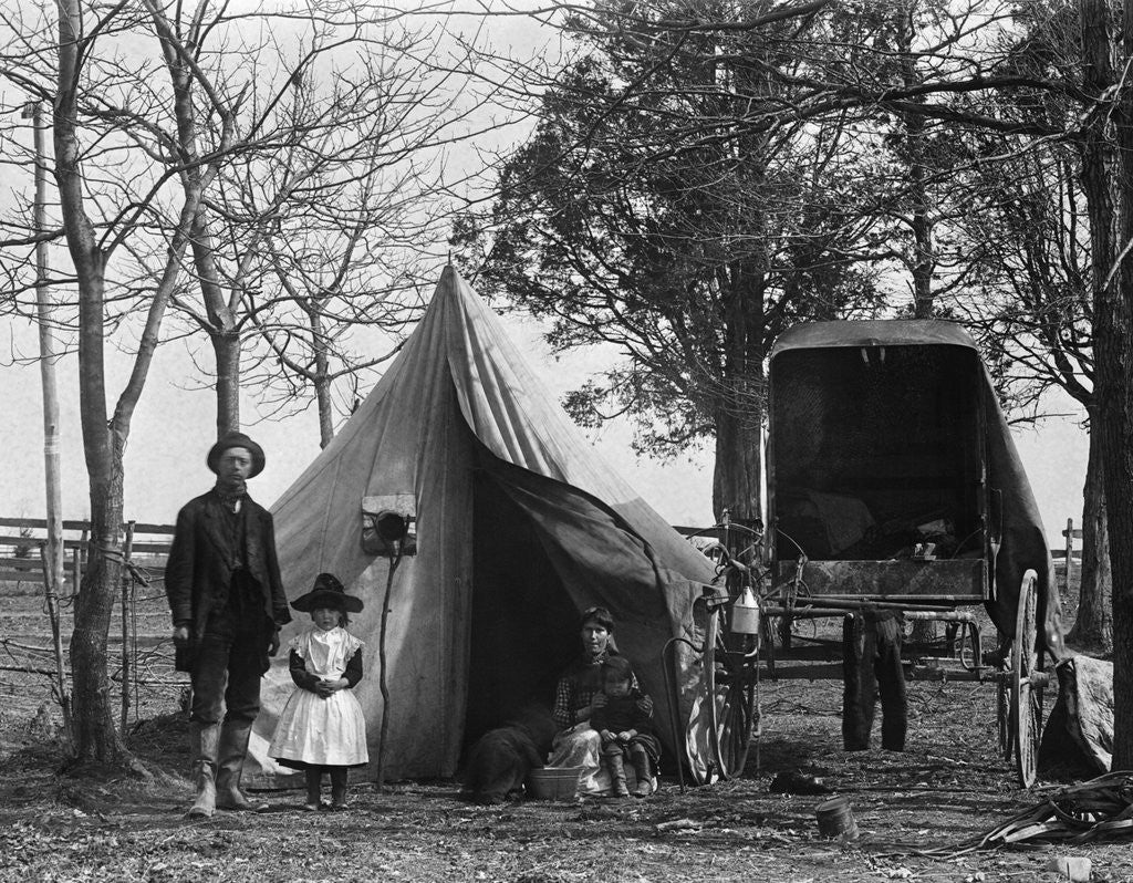 Detail of 19th Century Gypsy Camp Family Father Mother Daughter In Front Of Tent Next To Wagon by Anonymous