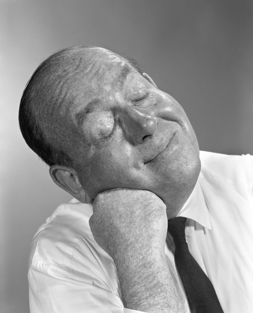 1950s 1960s Balding Man Leaning Head On Fist In Shirt And Tie Eyes Closed Thinking Expression by Corbis