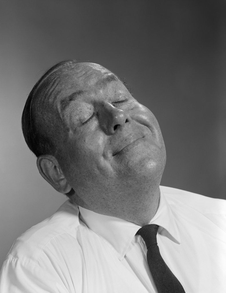 Detail of 1950s 1960s Happy Balding Man With Expression Of Satisfaction And Eyes Closed by Anonymous