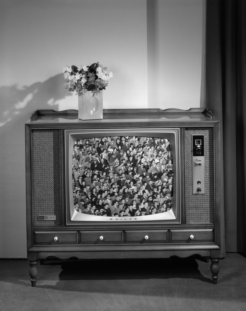 Detail of 1960s Head-On View Of Tv Set With Crowds In Bleachers On Screen by Corbis