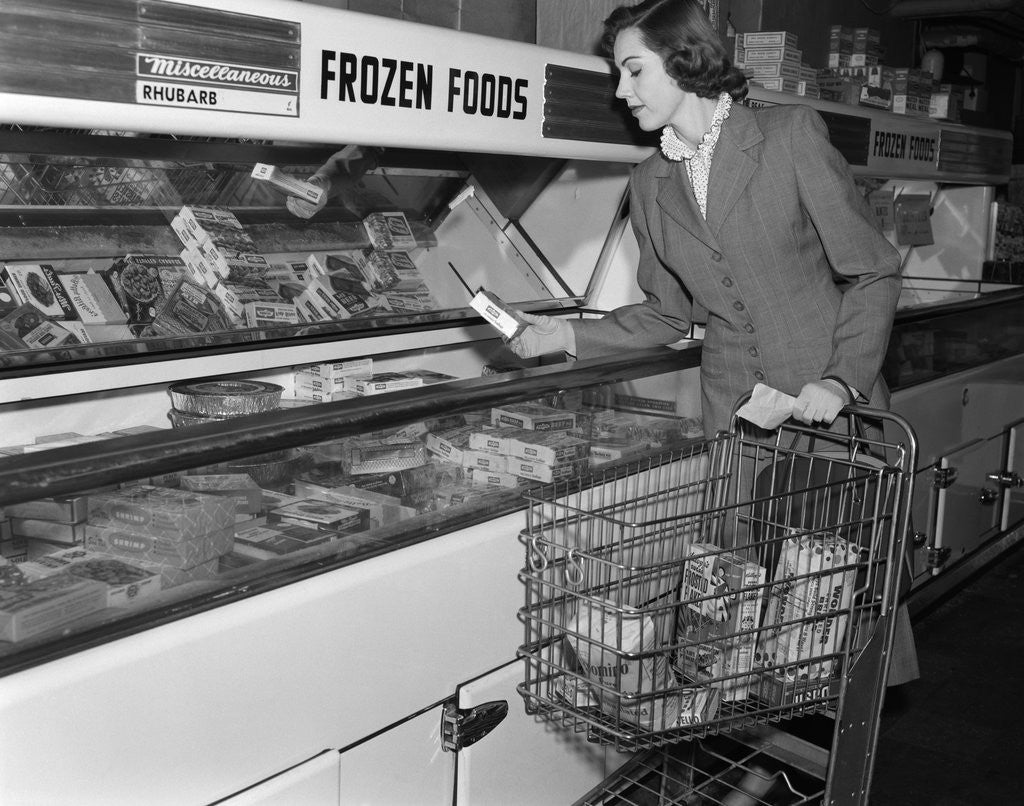 Detail of 1950s Woman Shopping Frozen Food Section Of Grocery Store by Anonymous