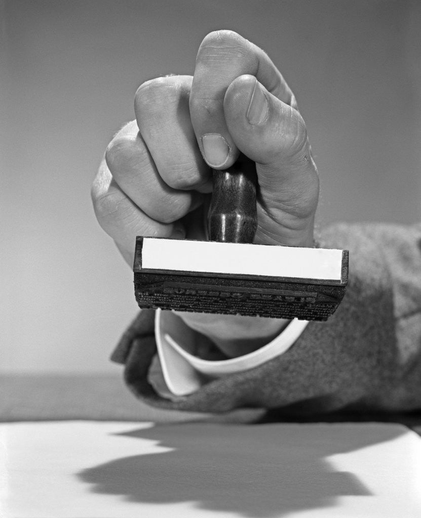 Detail of 1960s Man Hand Holding Rubber Stamp by Anonymous