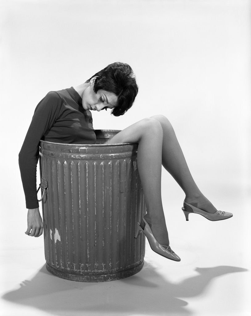 Detail of 1960s Young Woman In Trash Can by Anonymous
