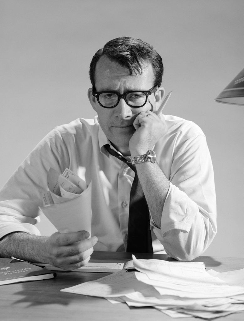 Detail of 1960s Man With Pile Of Bills And Worried Expression by Anonymous
