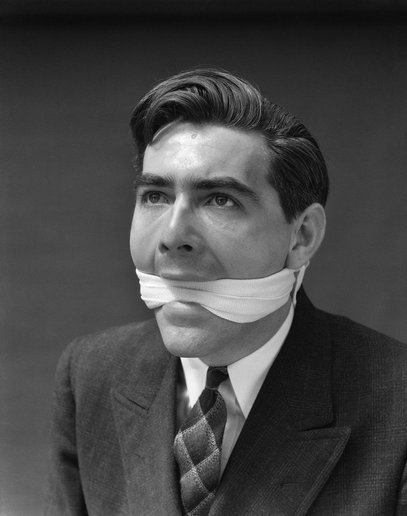 Detail of 1930s Portrait Of Man With Gag In Mouth by Anonymous
