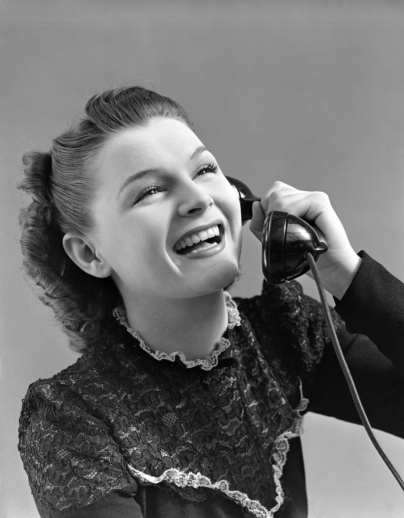 Detail of 1940s Woman Talking Laughing On Telephone by Corbis