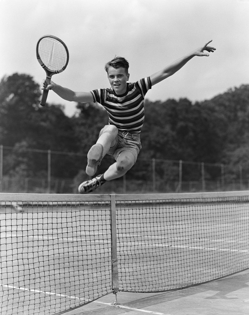 Detail of 1930s Teenage Boy Tennis Player Jumping Net With Racket In Hand by Anonymous