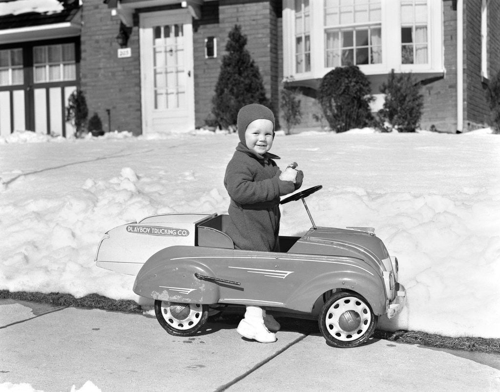 Detail of 1930s 1940s Little Boy Playing In Toy Car Outside In Snow by Anonymous