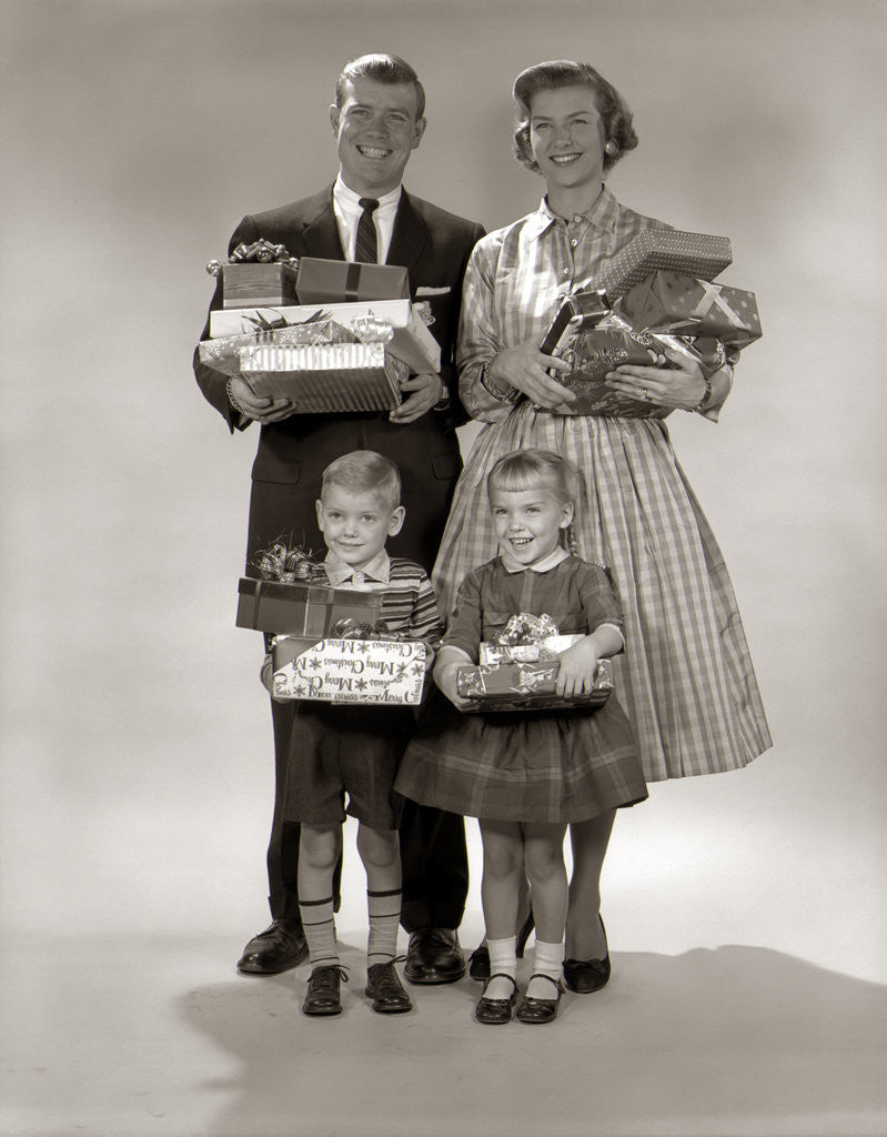 Detail of 1950s 1950s Family Carrying Christmas Gifts Wrapped Presents by Anonymous