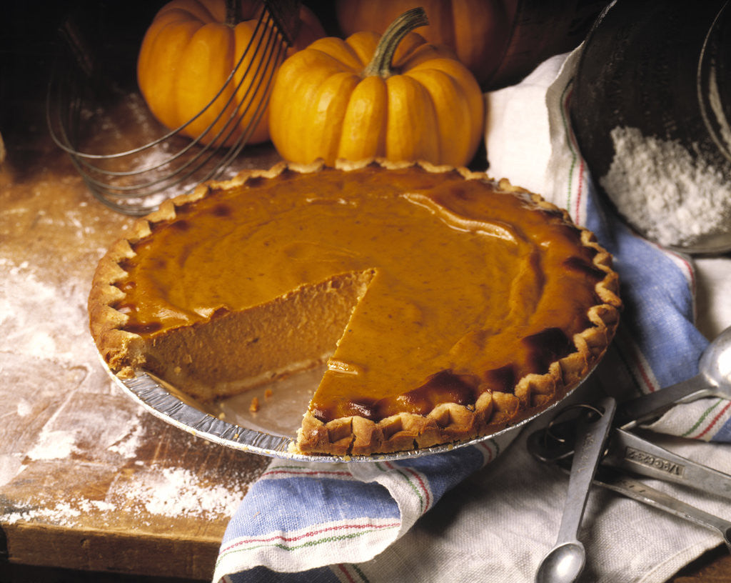 Detail of Pumpkin Pie with Slice Removed by Corbis