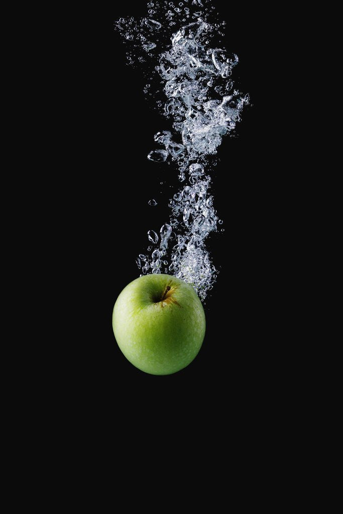 Detail of Green Apple in Water by Corbis