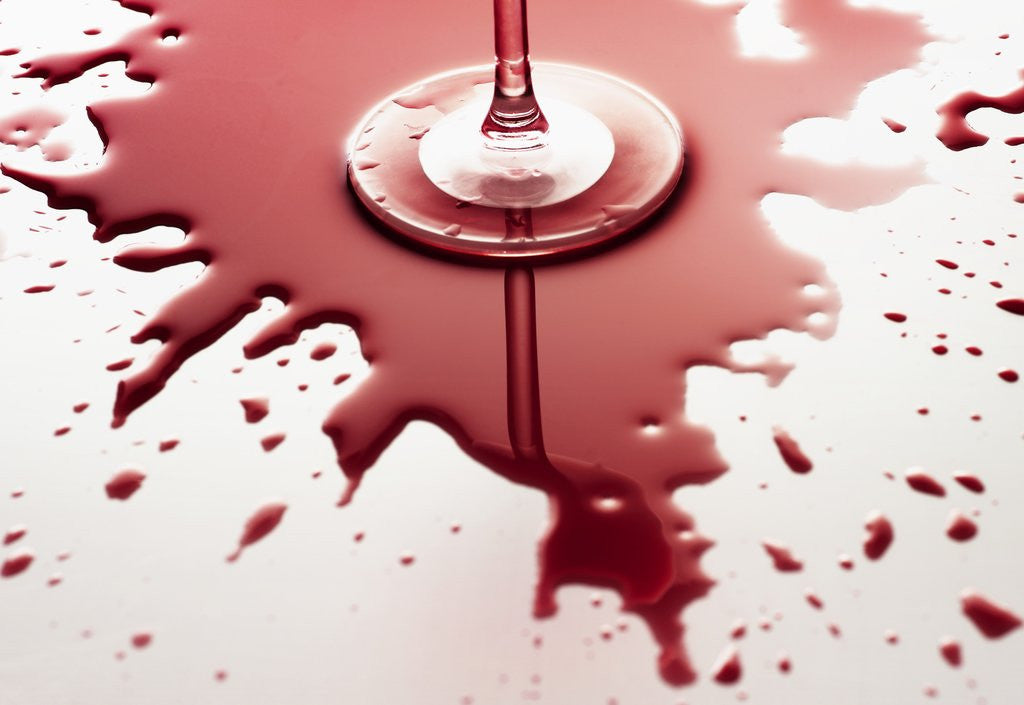 Detail of Red wine spilled around glass by Anonymous
