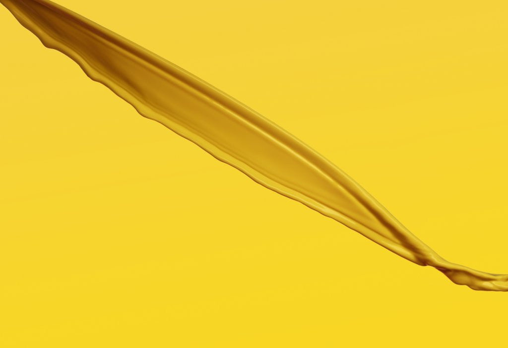 Detail of Pouring yellow liquid on yellow background by Anonymous