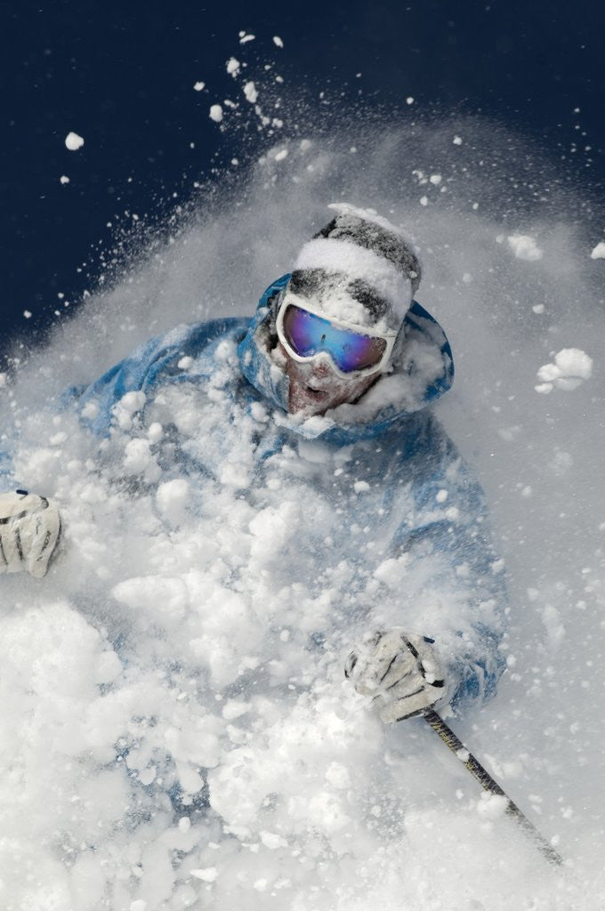 Detail of Skier in deep powder snow by Corbis