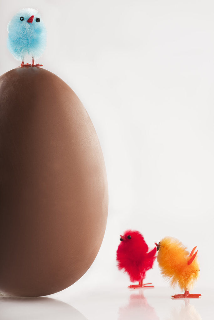Detail of Tiny toy chicks by large chocolate egg by Anonymous
