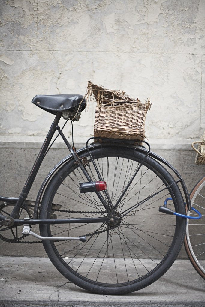 Detail of Bicycle with weathered basket by Anonymous