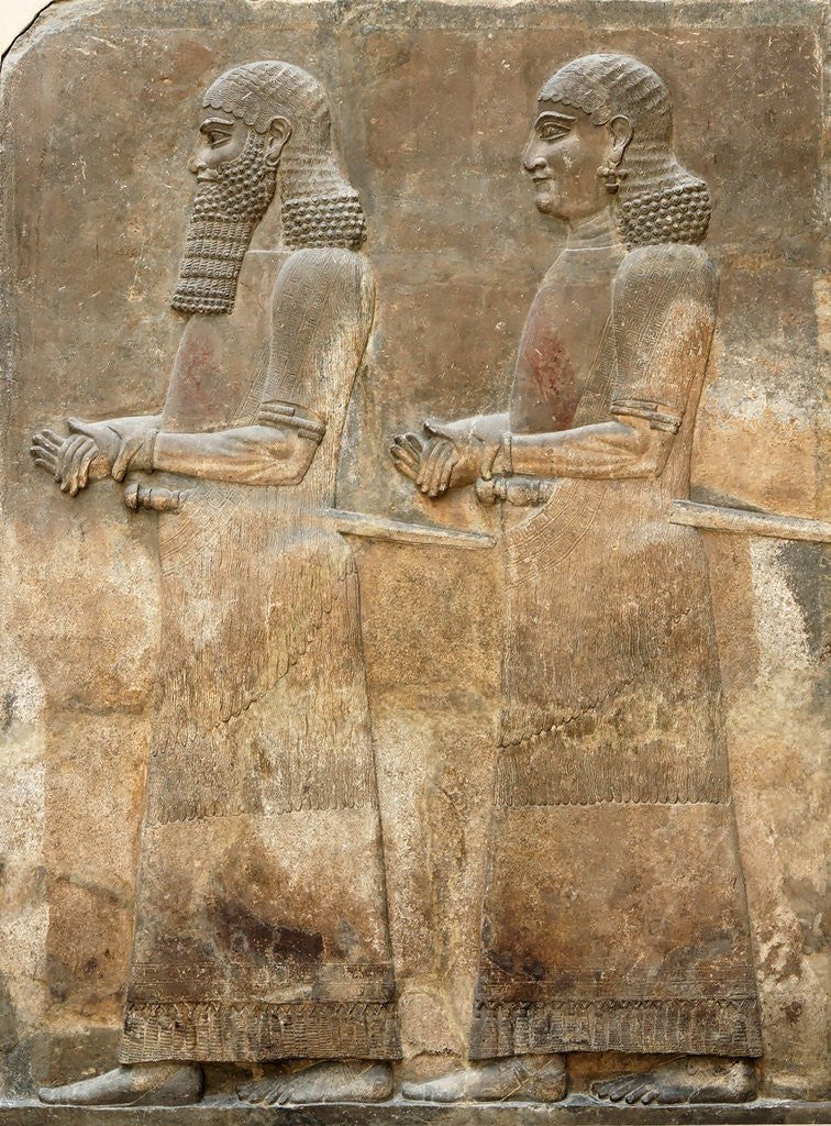 Detail of Assyrian low-relief of two civil servants by Corbis
