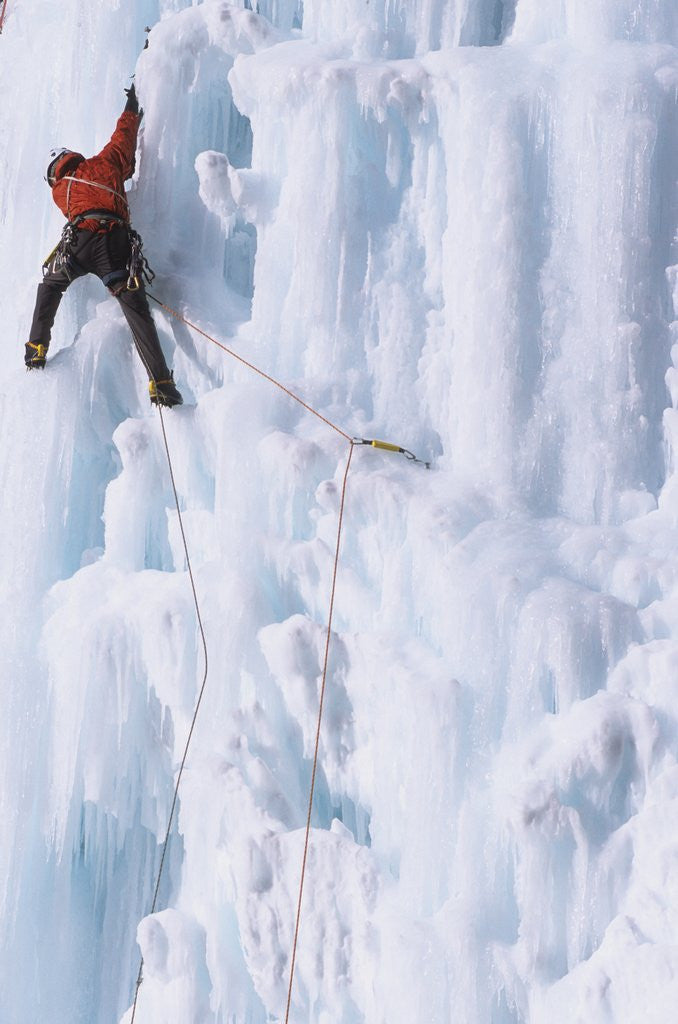 Detail of An Ice Climber Ascending the Malignant Mushroom, WI 5, Ghost River, Alberta, Canada by Corbis